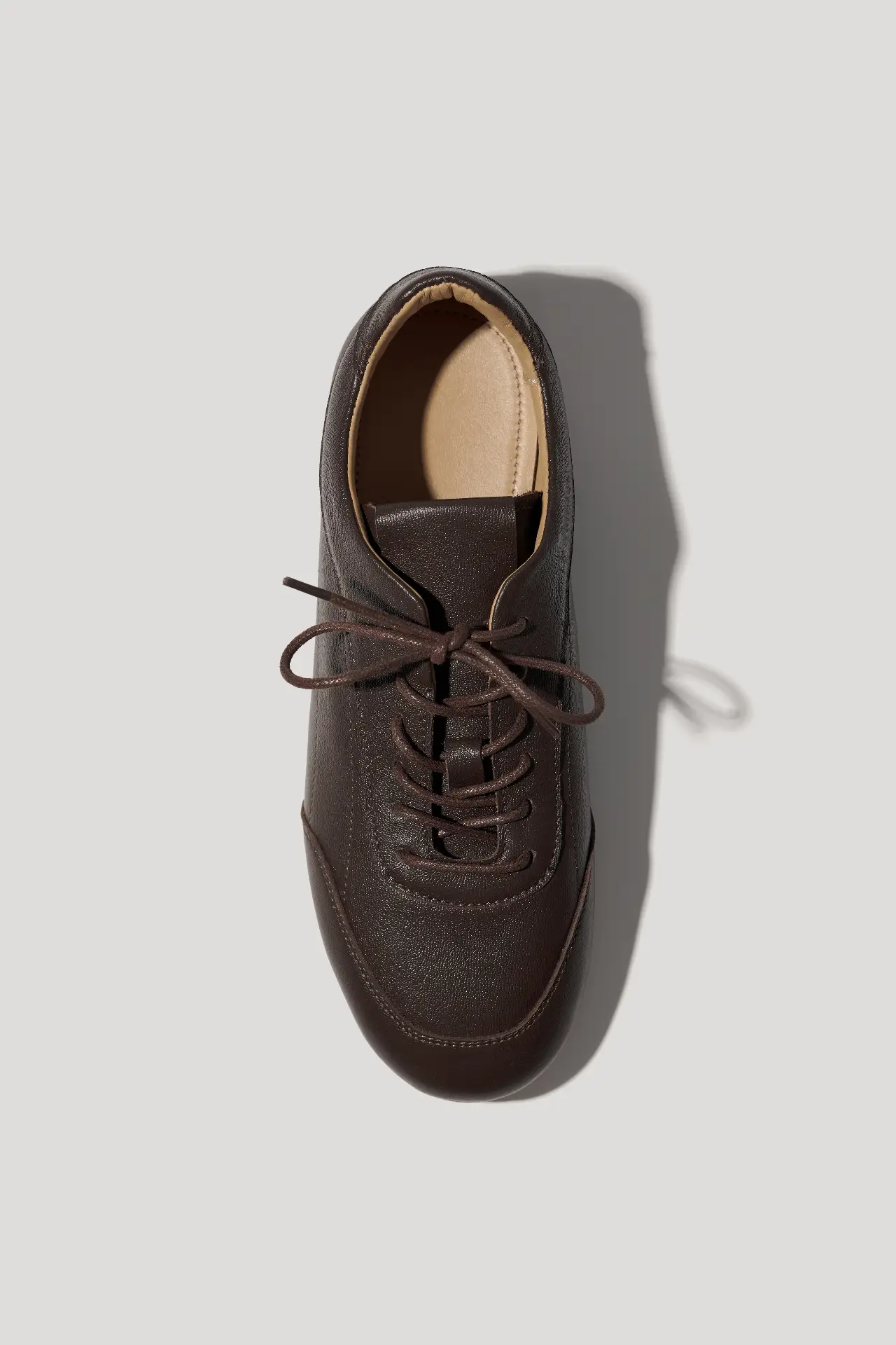 Кеди шоколадні шкіряні на низькій підошві