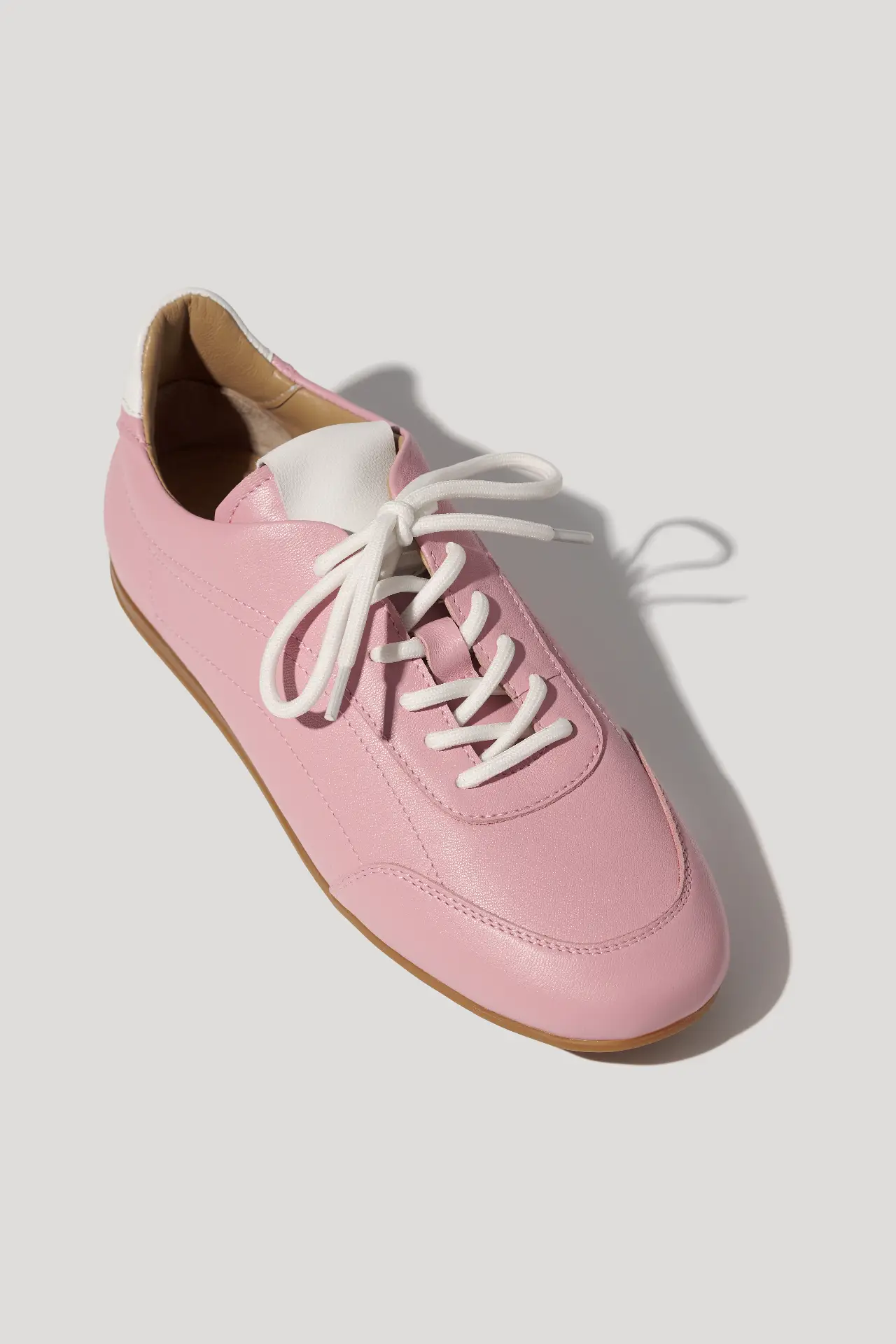 Кеди рожеві шкіряні на низькій підошві