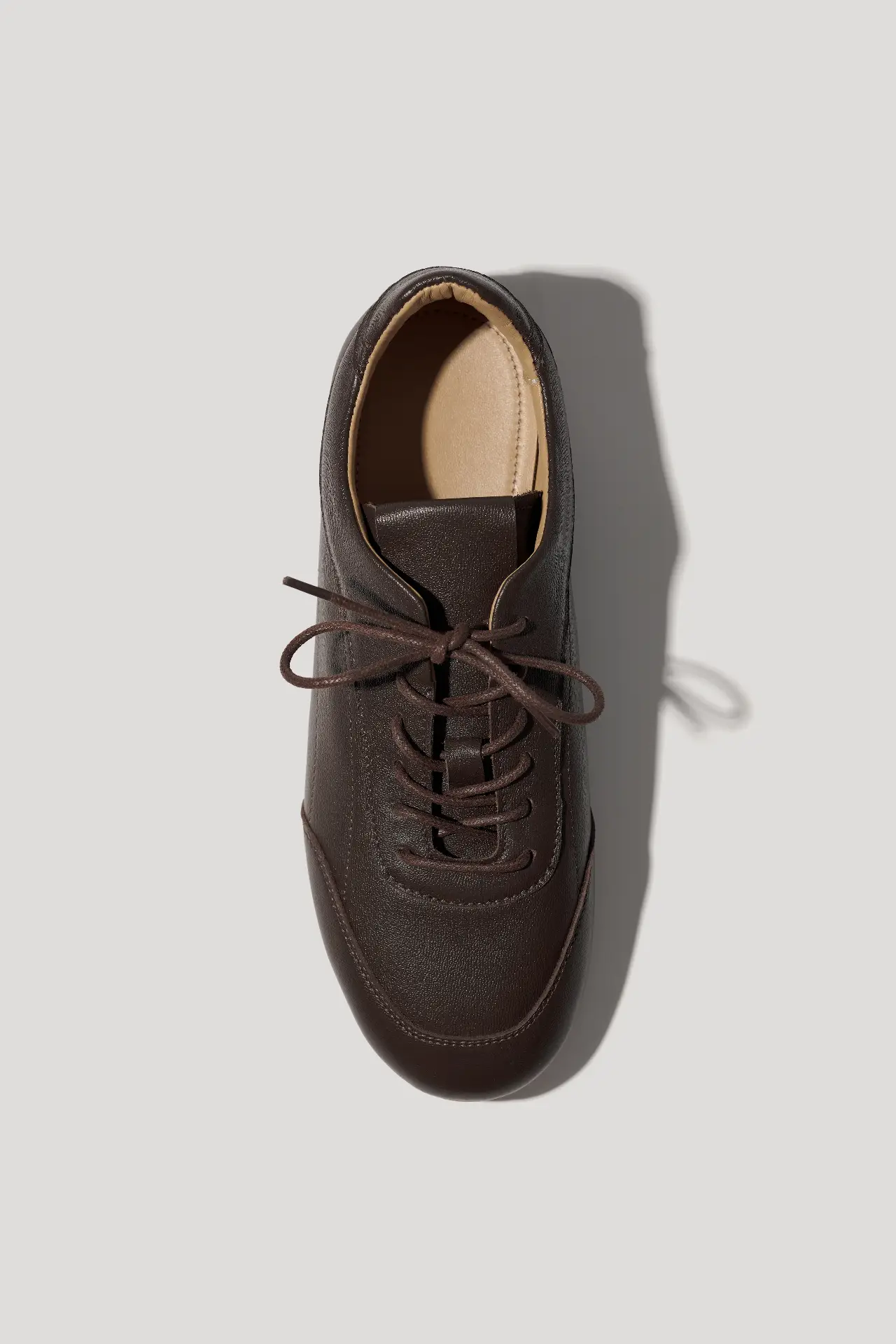 Кеди шоколадні шкіряні на низькій підошві