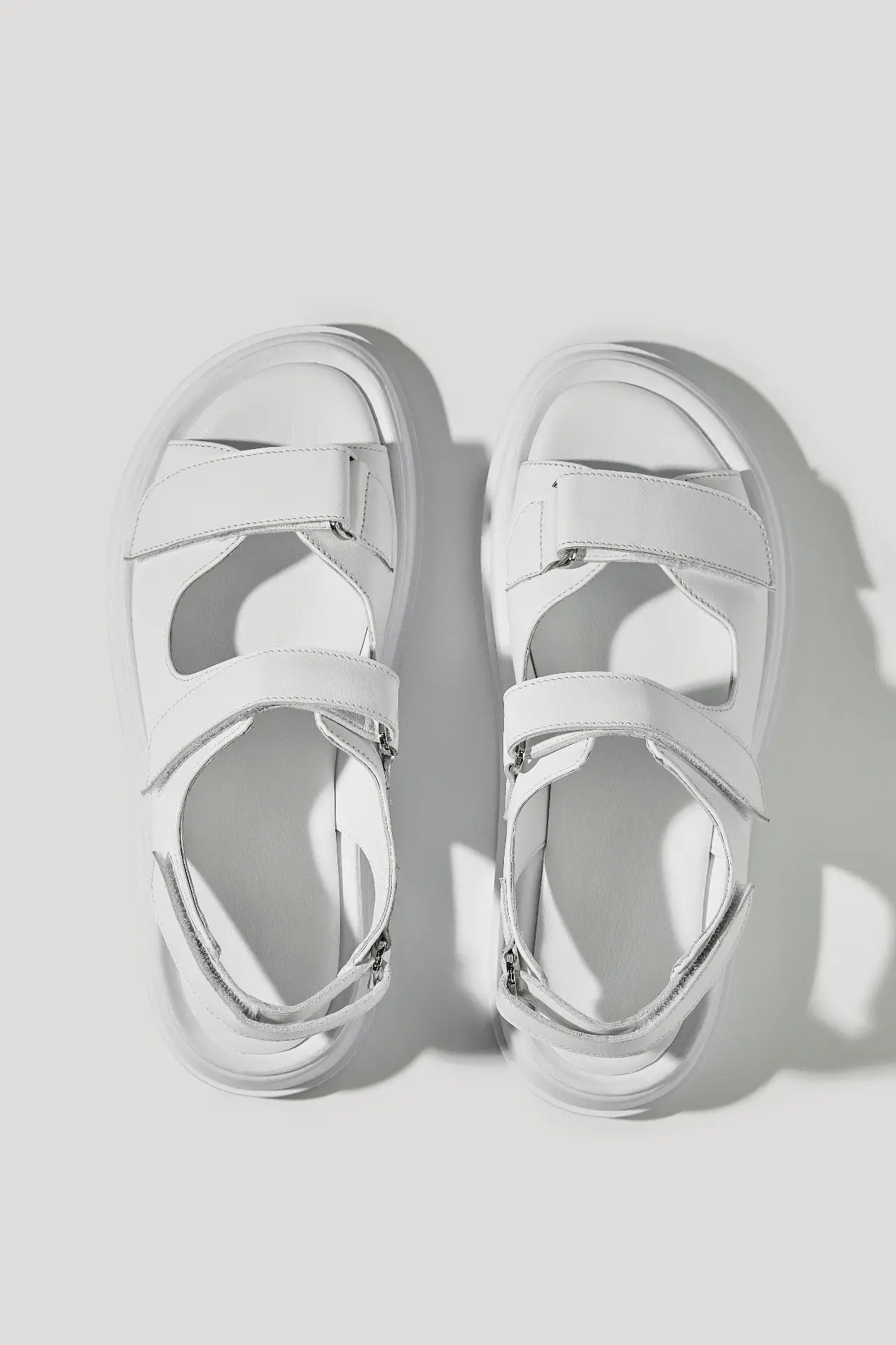 White leather sandals with hook-and-loop straps
