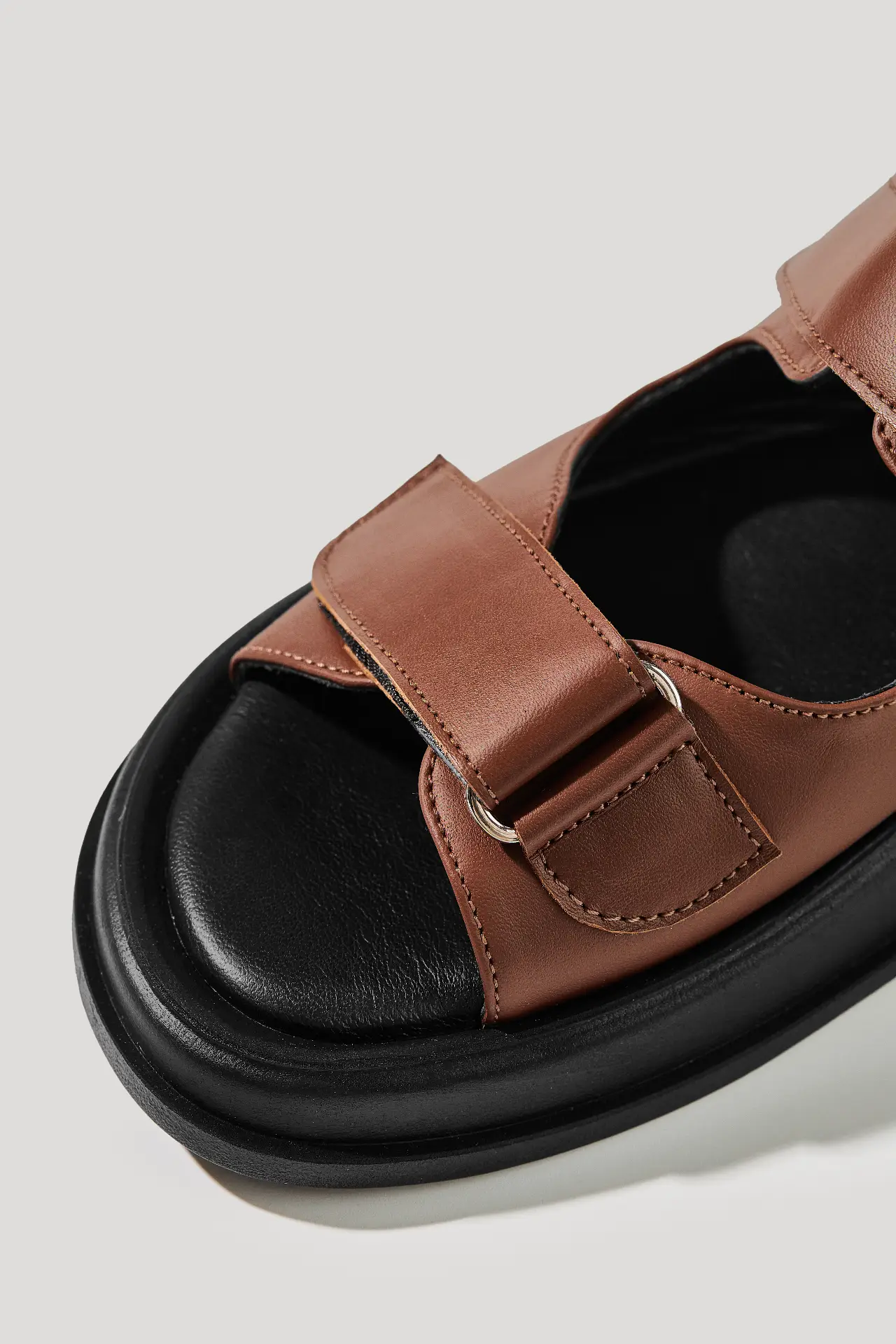 Brown leather sandals with hook-and-loop straps