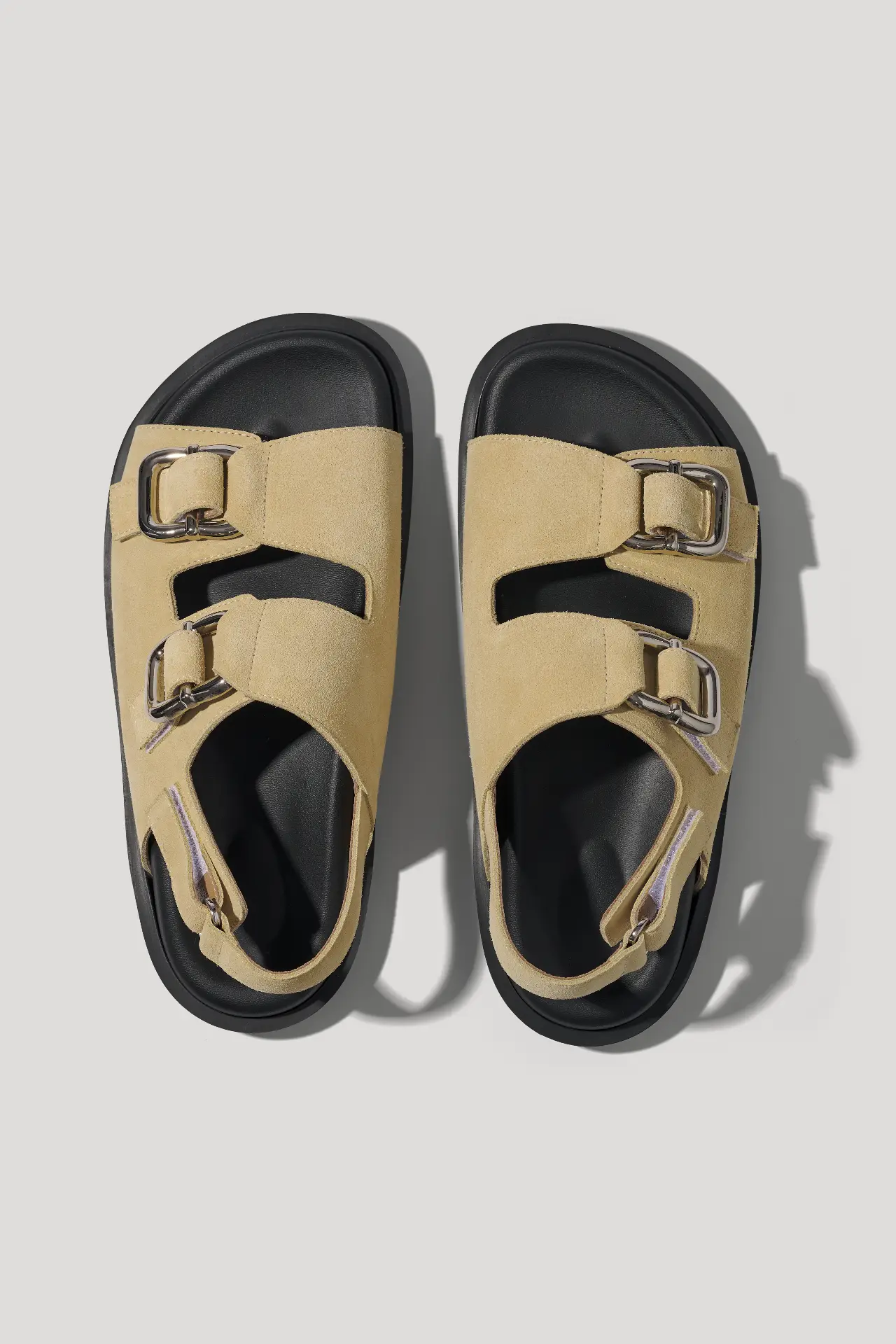 Butter yellow suede sandals with chunky hardware and hook-and-loop straps