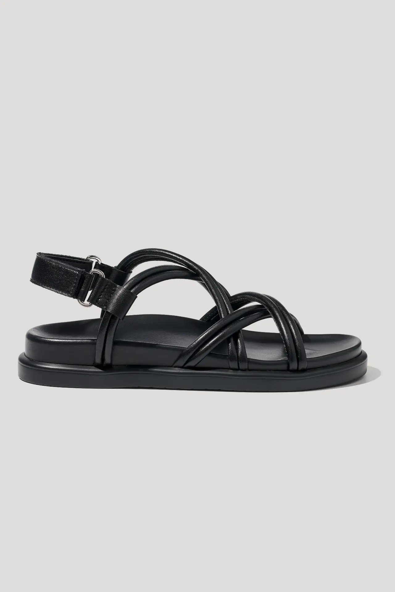 Black leather sandals with cross‑straps