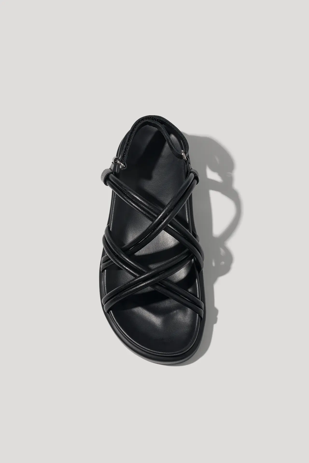 Black leather sandals with cross‑straps