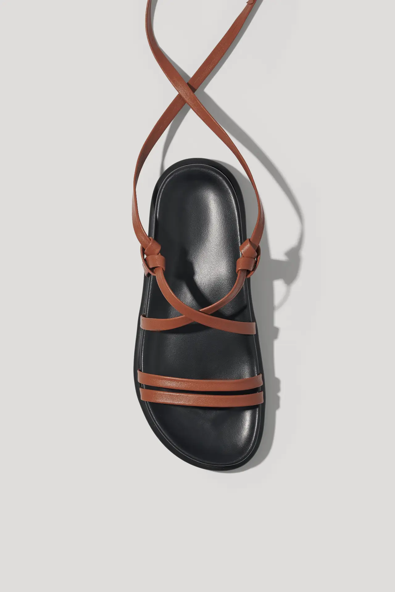 Brown leather sandals with long straps