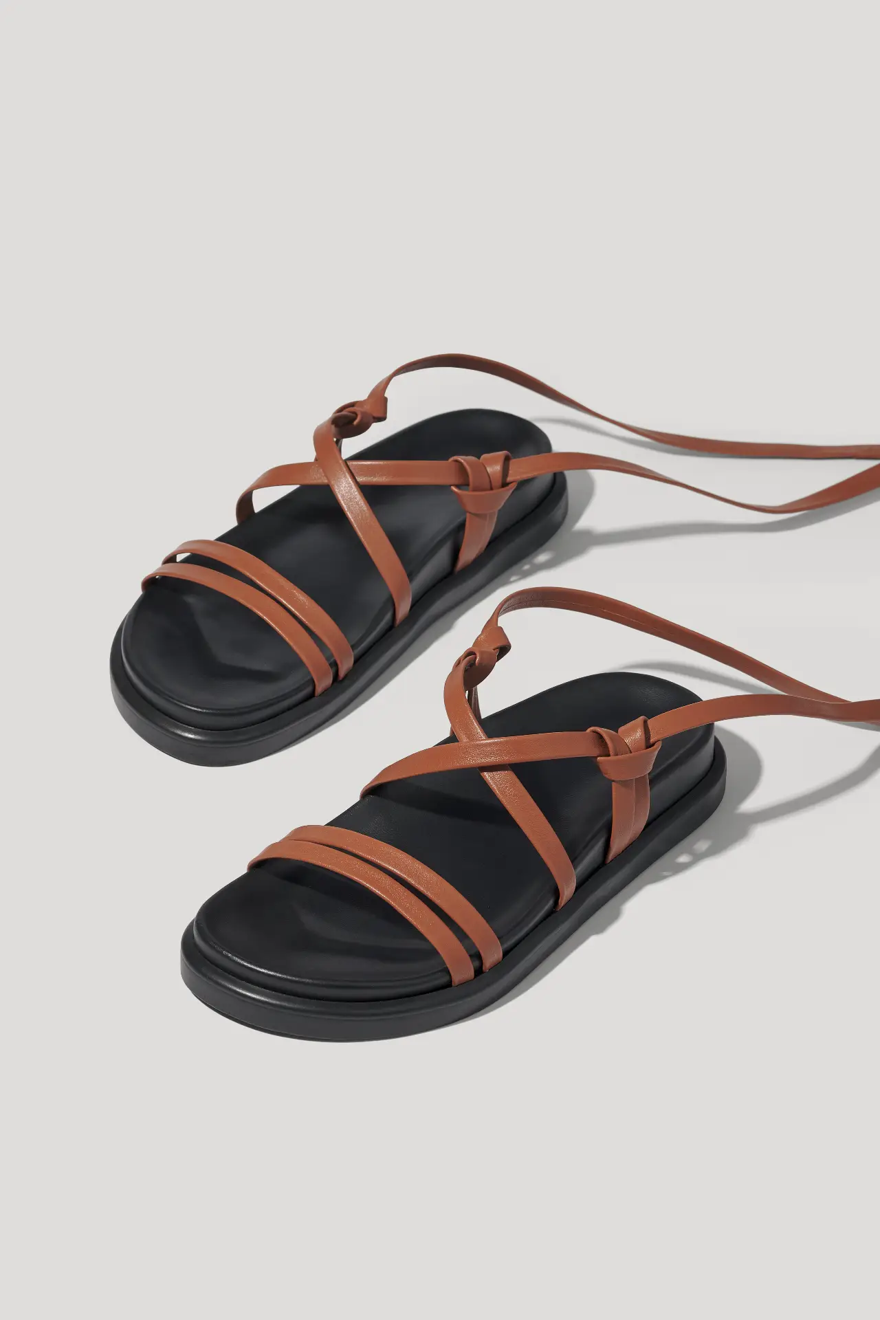Brown leather sandals with long straps