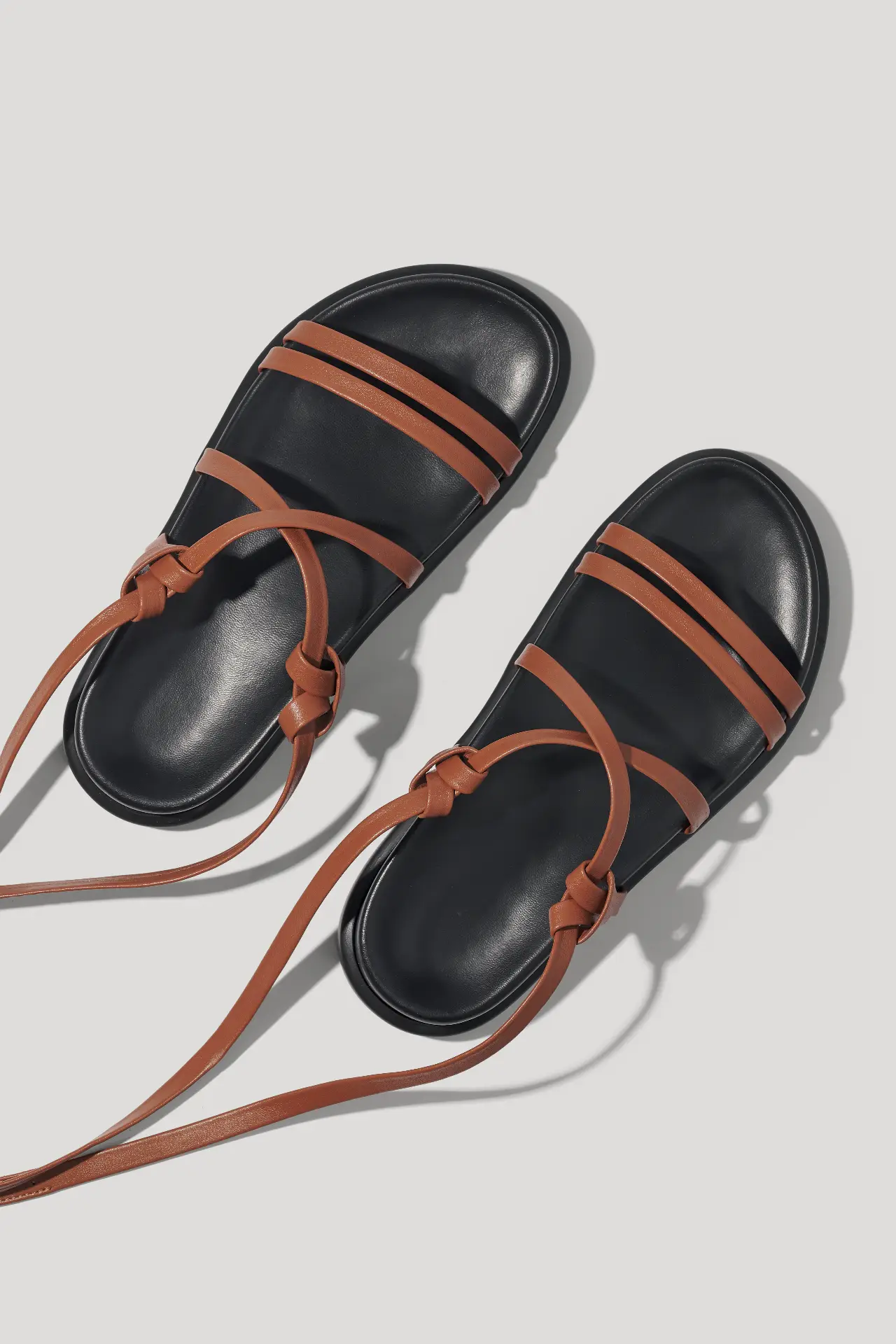 Brown leather sandals with long straps