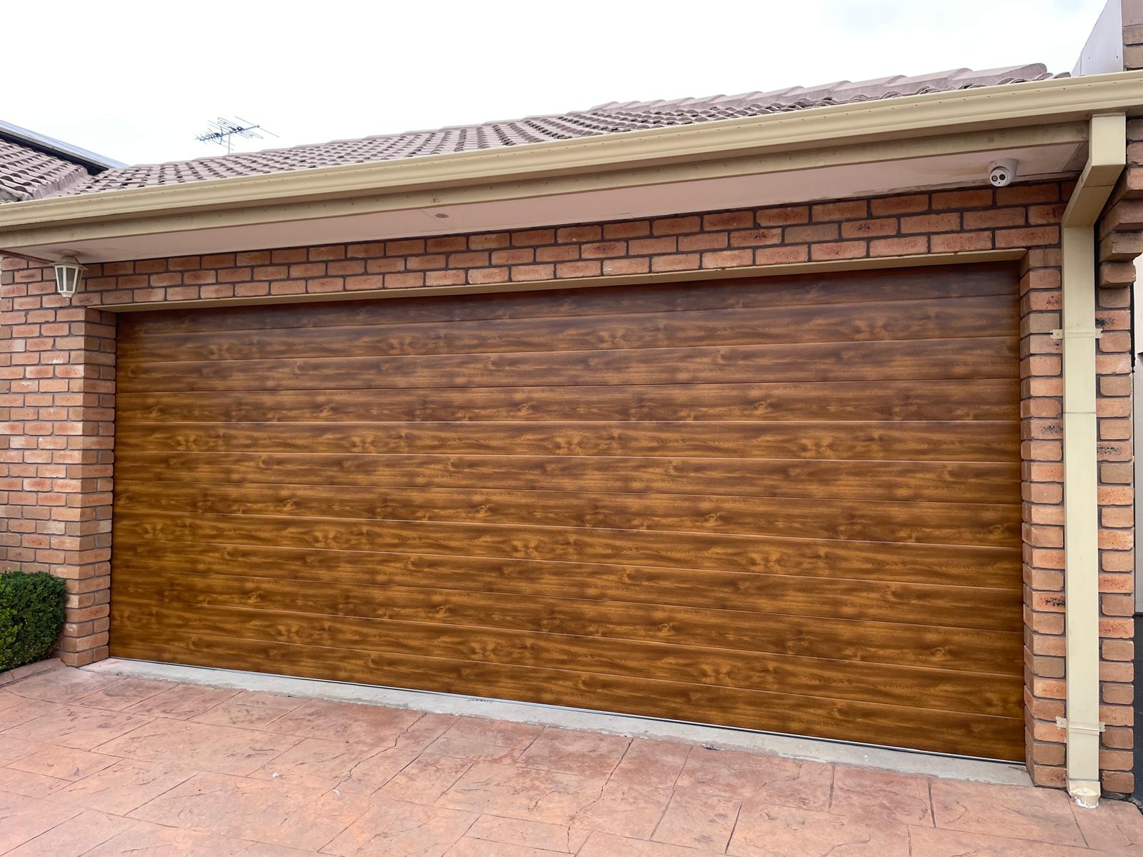A modern suburban house with a stylish garage door.