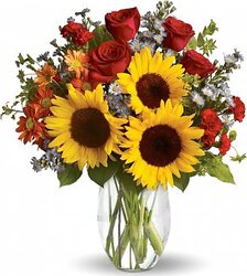 Florero surtido con rosas y girasoles , margaritas y otras