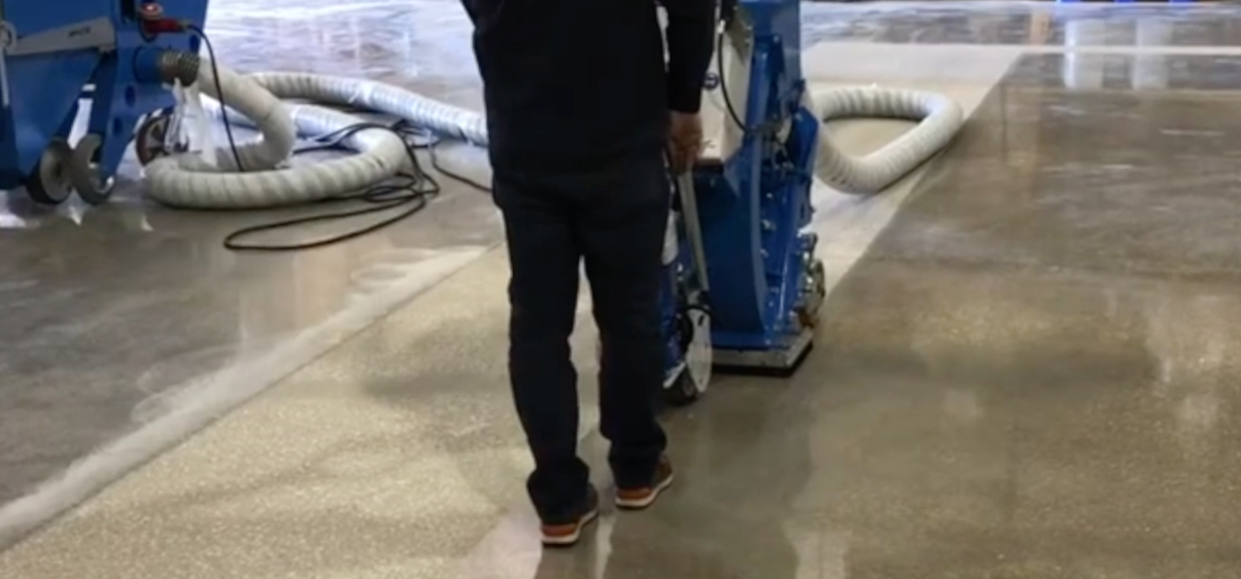 Grinding concrete floor for polishing in Toronto warehouse