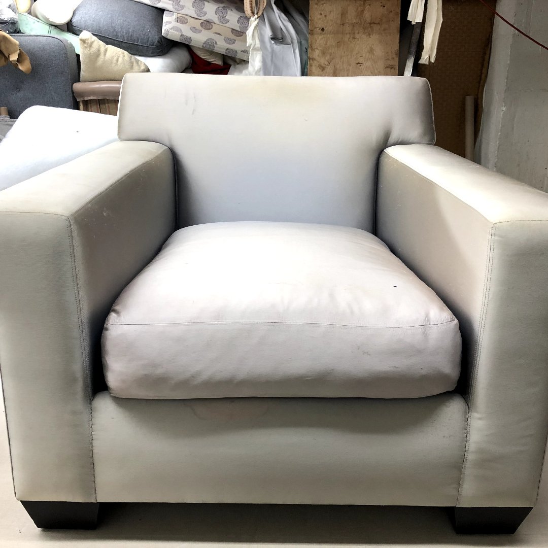 High-end custom armchair featuring deep-seated comfort and artisan upholstery techniques