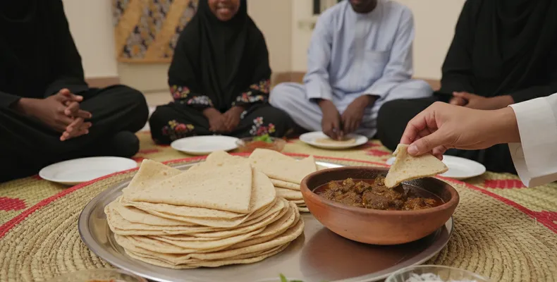 Kisra tradicional: o pão-panqueca sudanês de sorgo fermentado, fino e ácido, com o ensopado mullah