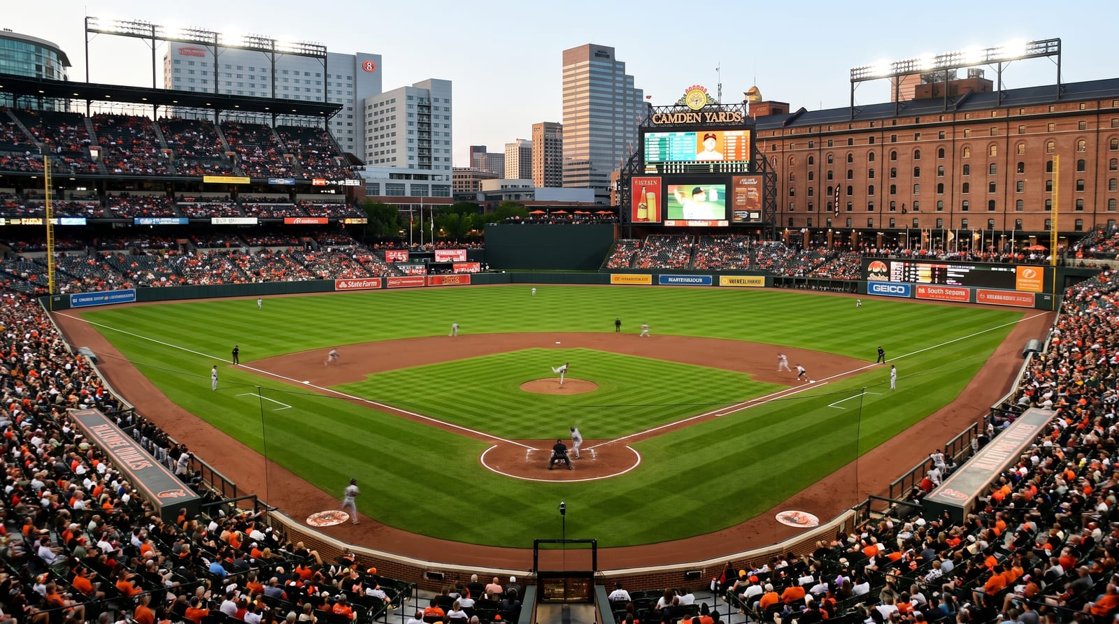 Orioles Beat Blue Jays 4-2 Behind Gibson's Seven Strikeouts and Encarnacion-Strand's Homer