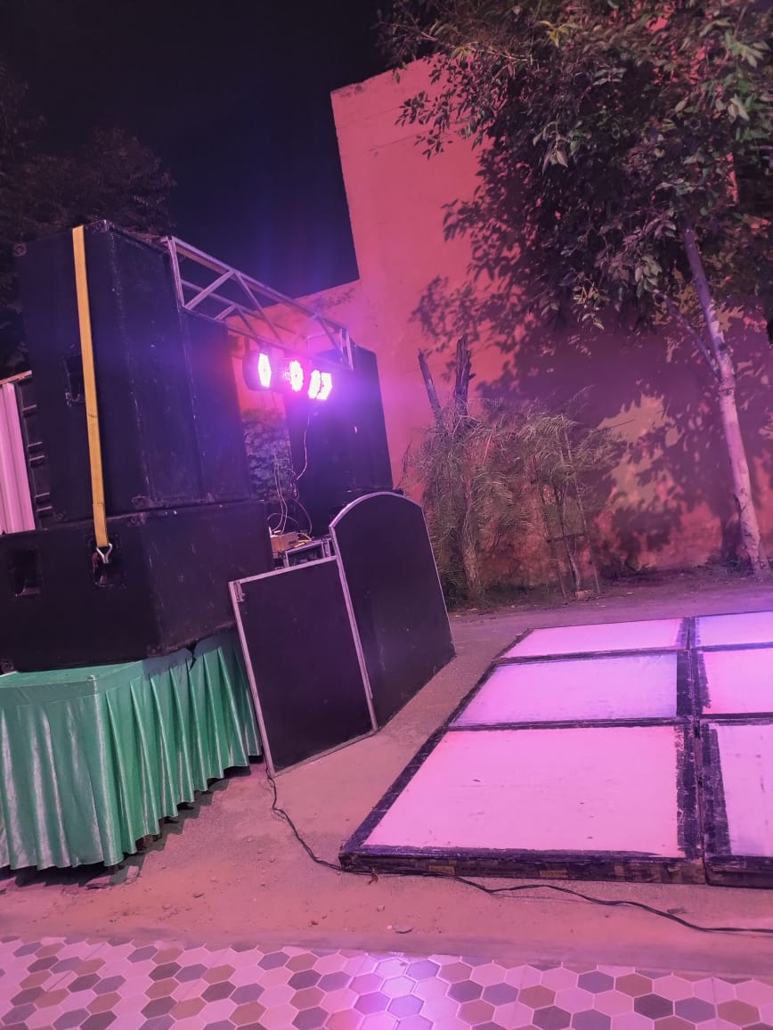 Om DJ and Rishi DJ duo performing at event in Noida with full DJ setup