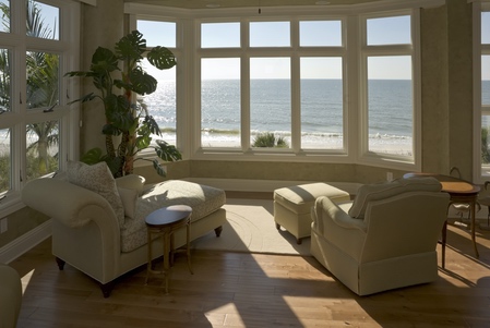 living room with impact hurricane coastal windows