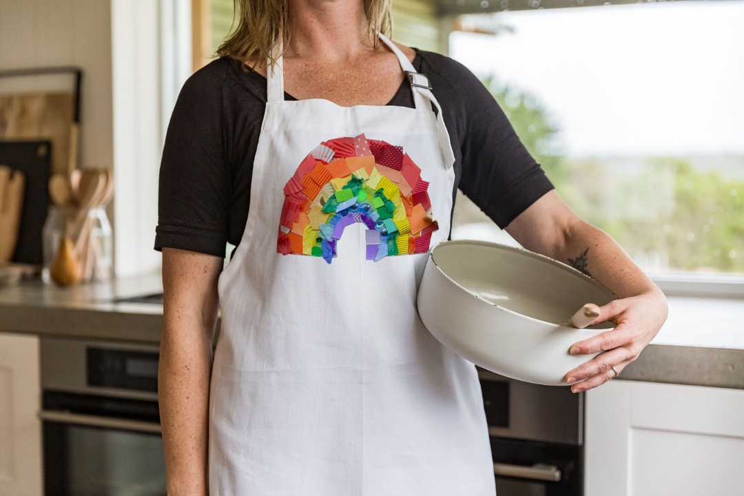 Custom white printed apron with rainbow collage for school fundraiser
