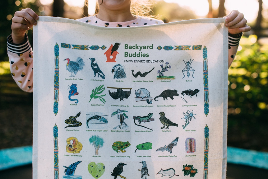 Personalised charity tea towel for Backyard Buddies featuring animal drawings