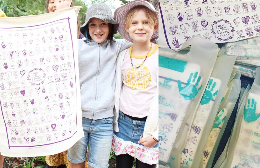 Children holding custom printed organic cotton school fundraising tea towel