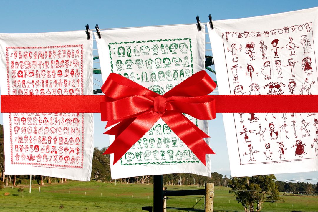 Festive Expressions Tea Towels featuring Christmas borders for school fundraising.