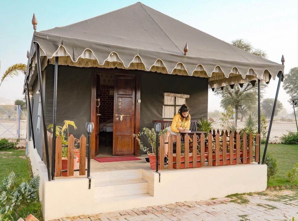 Poolside seating and evening lighting at The Dream Resort, Kalwar Road, Gajadharpura, Jaipur (Photo 9)