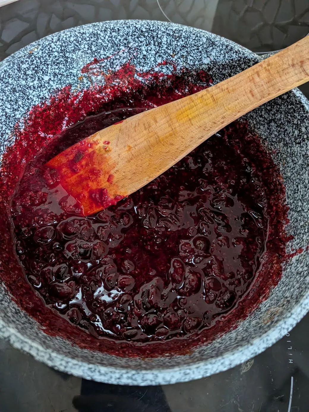 jam after simmering showing consistency