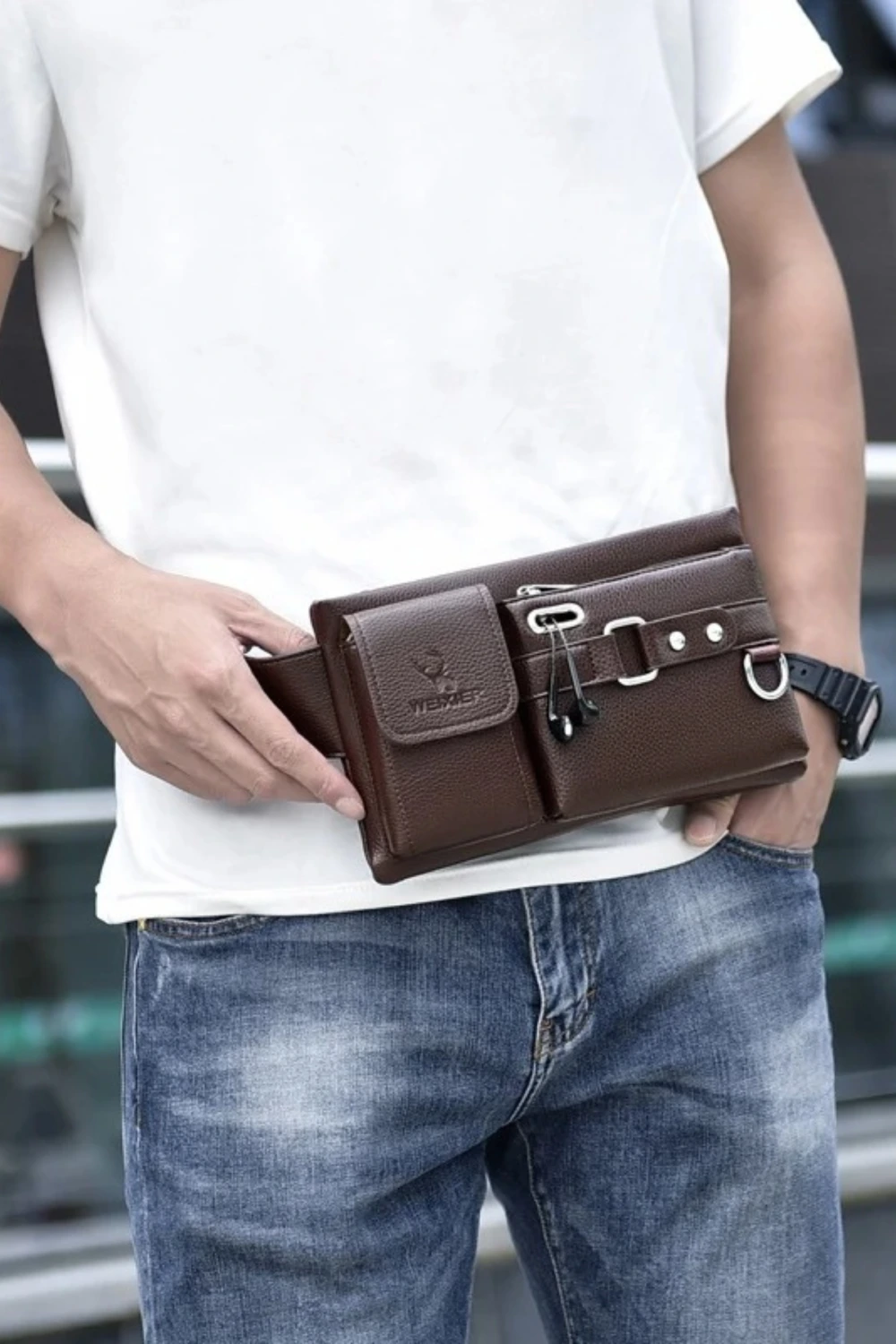 A stylish, multifunctional shoulder bag displayed prominently.