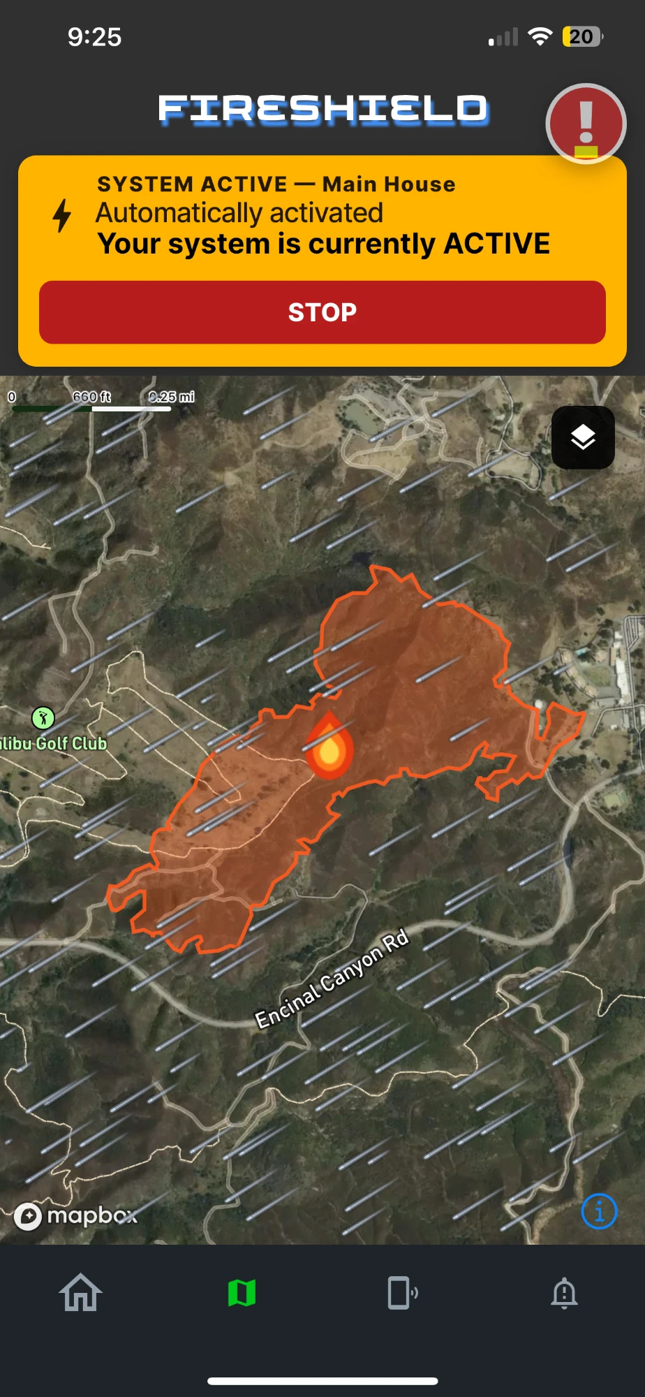 The FireShield app at 9:25 p.m. on Oct. 15, 2026: a detailed orange outline of the Bryson Fire along Encinal Canyon Road, with wind arrows and a banner reading System Active, Main House, Automatically activated.