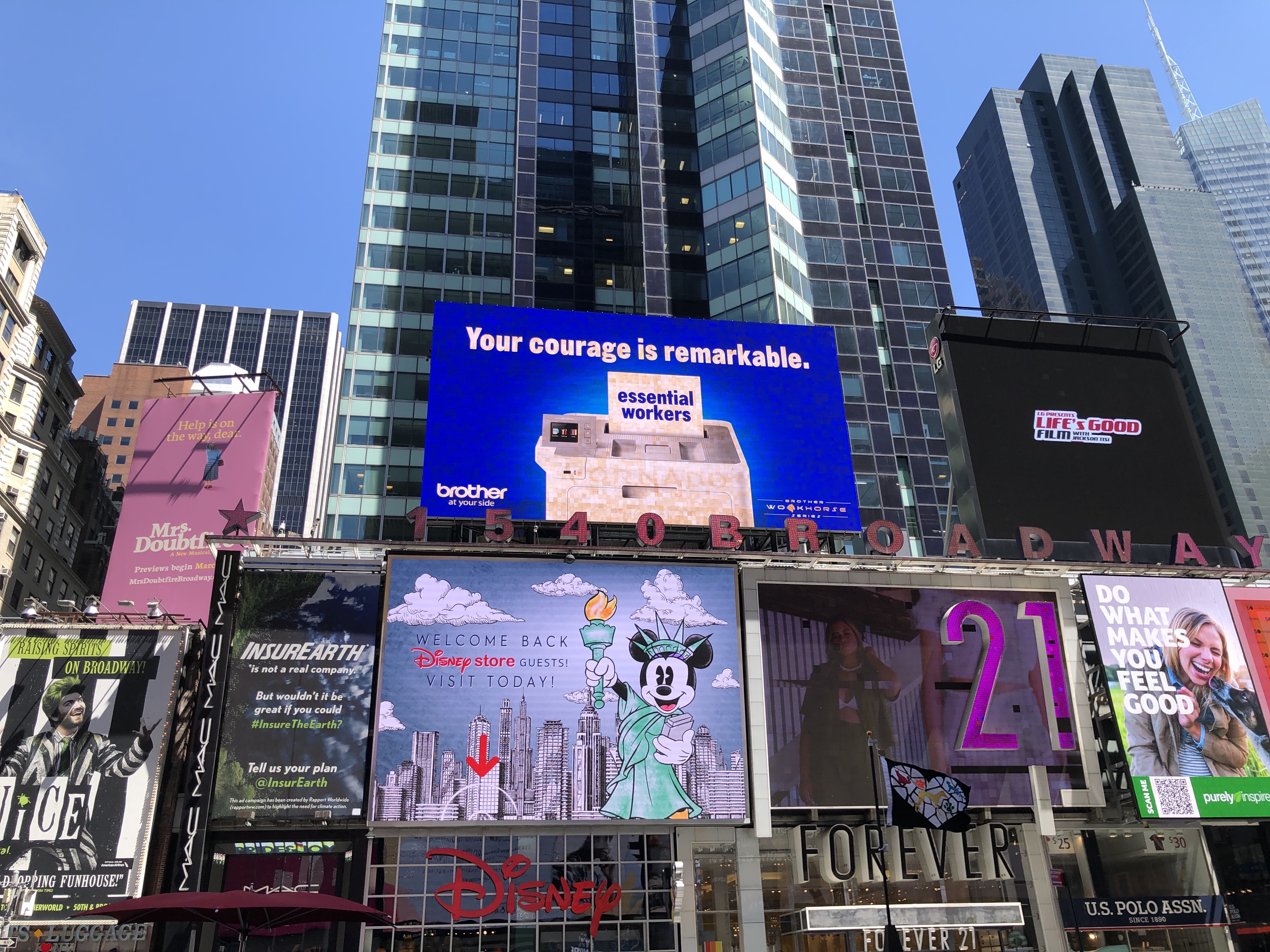 A billboard in Times Square dedicated to essential workers in 2021.