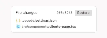 A screenshot of the "File changes" card showing two files changed and a "Restore" button.