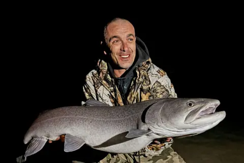 Guest catch during a guided fishing session on the Lim