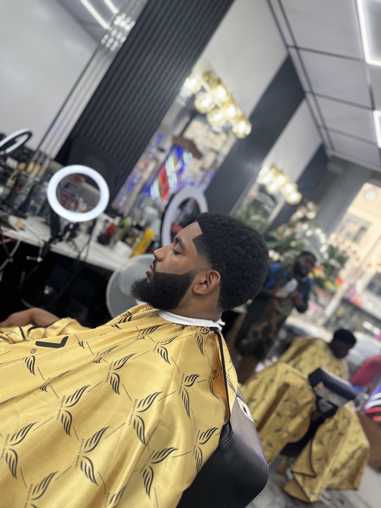 Work by Akwasi Sark The Barbers