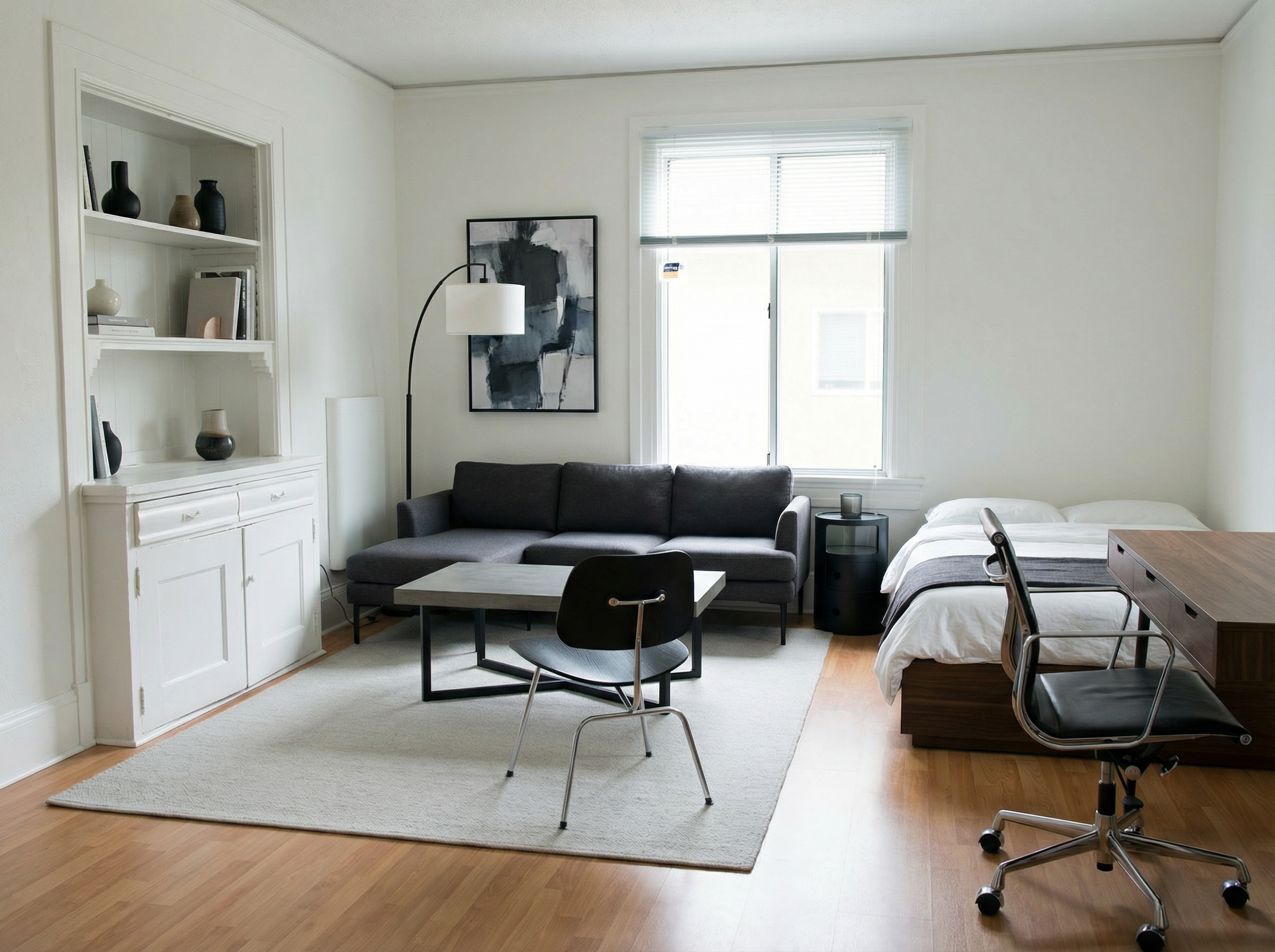 The same studio apartment transformed with modern furniture and cohesive design