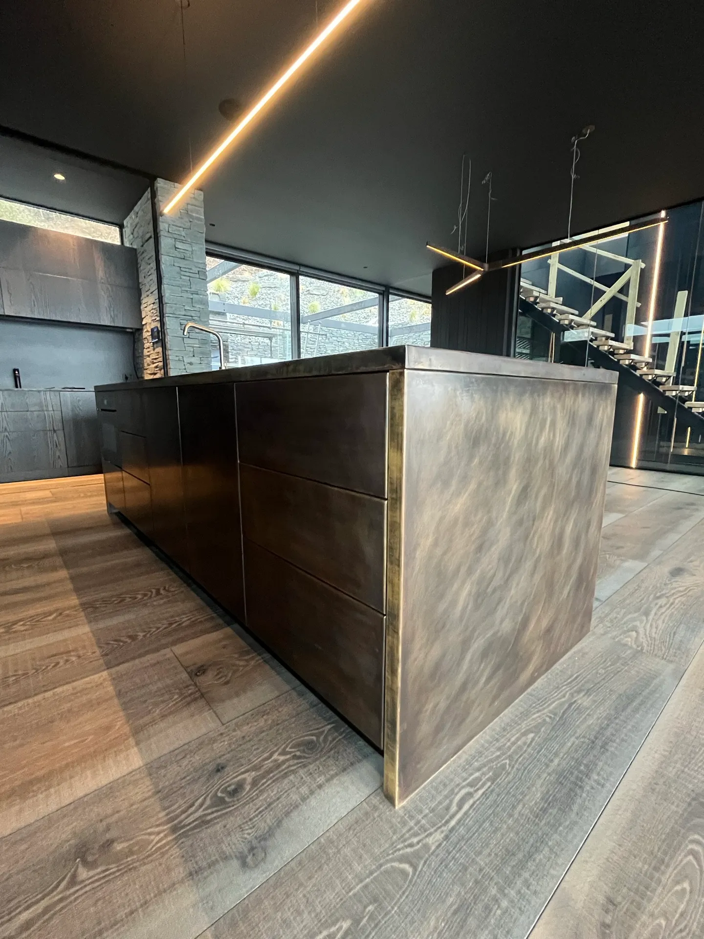 Folded brass kitchen island