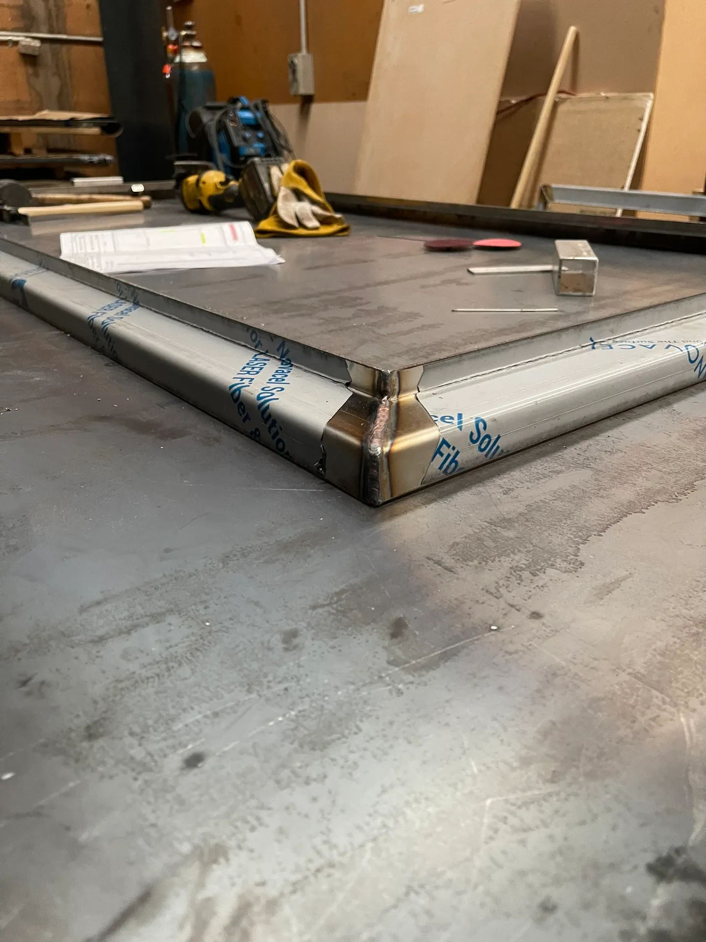 Folded stainless steel mirror