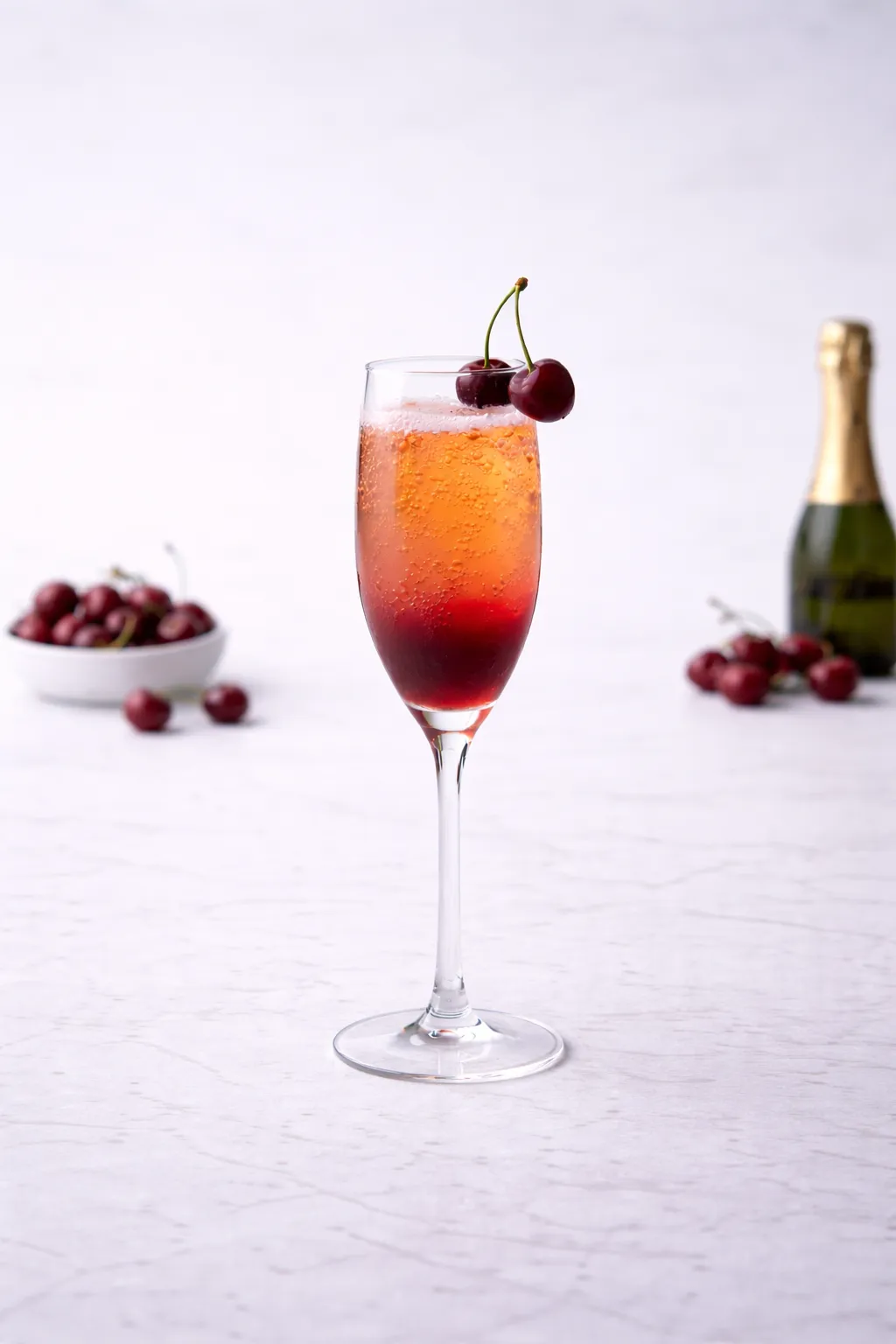 Champagne cocktail with cherries