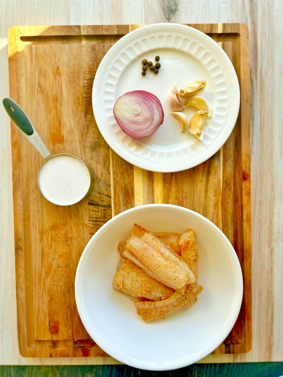 Easy Caribbean Cod Fish Dinner in Creamy Coconut Tomato Sauce