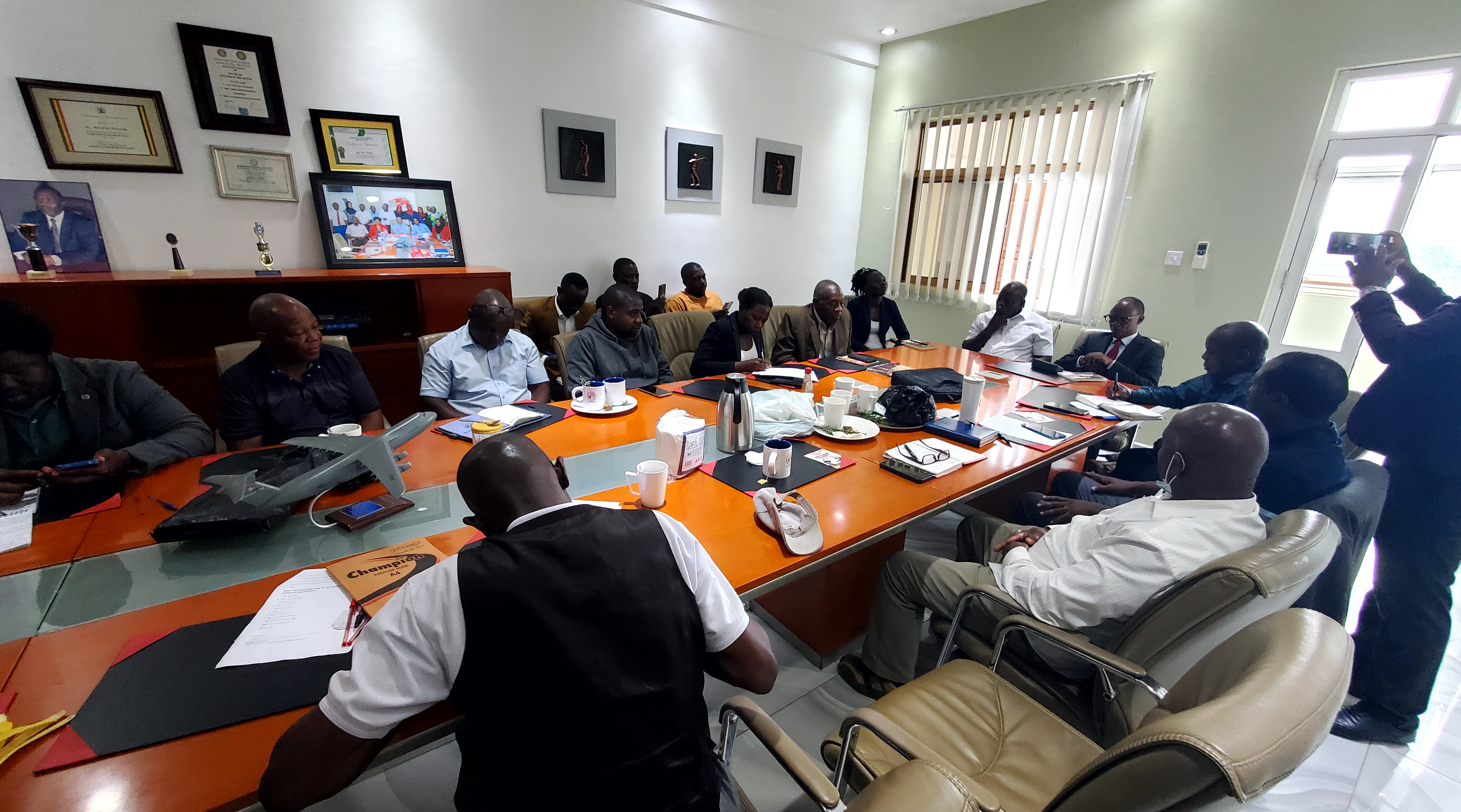 Kimera Ronald, with the Executive Committee and other guests. 