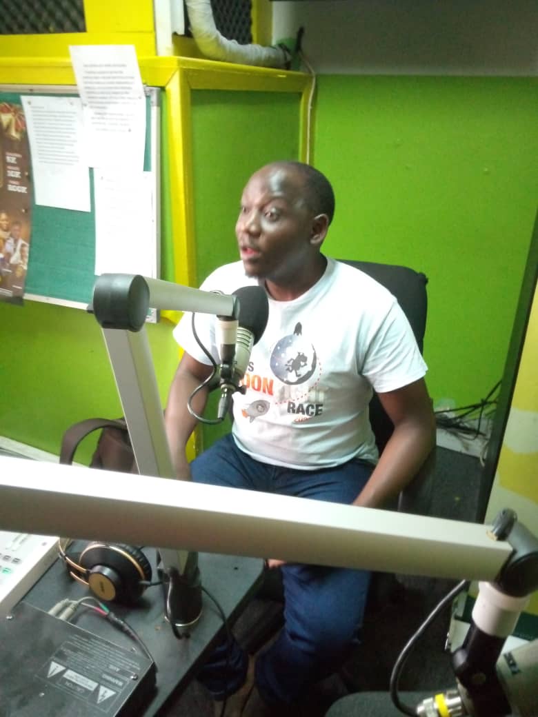 Dr Muwonge Jabura the lead doctor on the airs of Radio Simba before the medical camp 2025