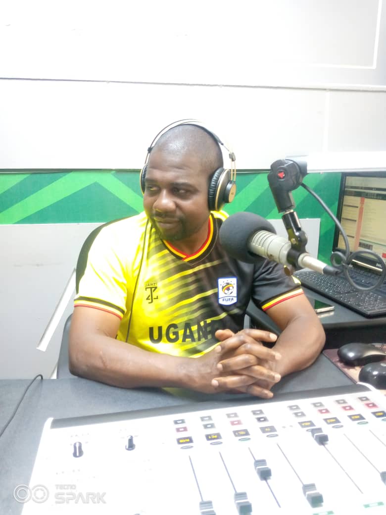 Renowned sports presenter and FFI National Coordinator, Mr. Walusimbi Wooto hosting in Radio Simba Studio.