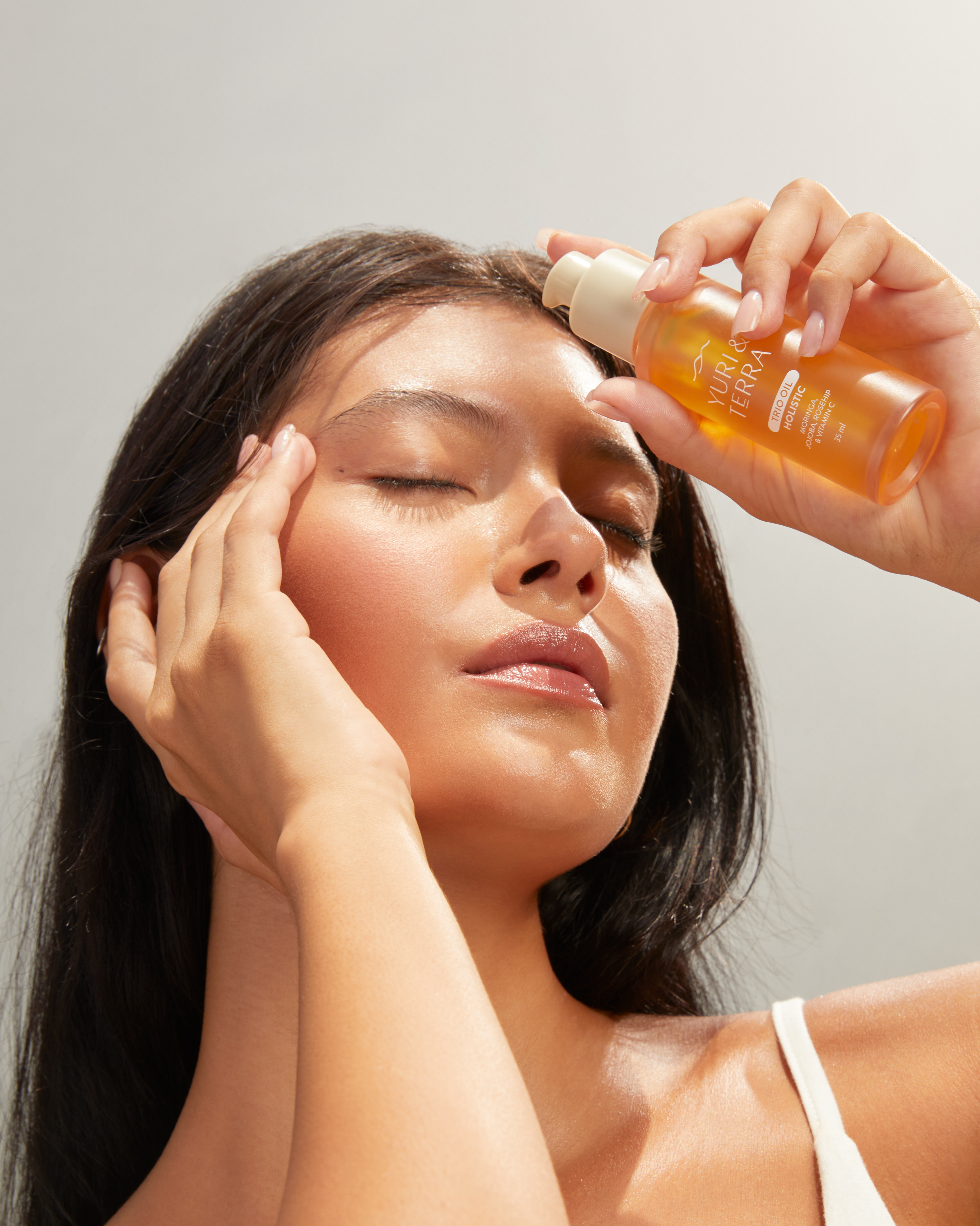 Applying Trio Oil Holistic for Facial Care Routine