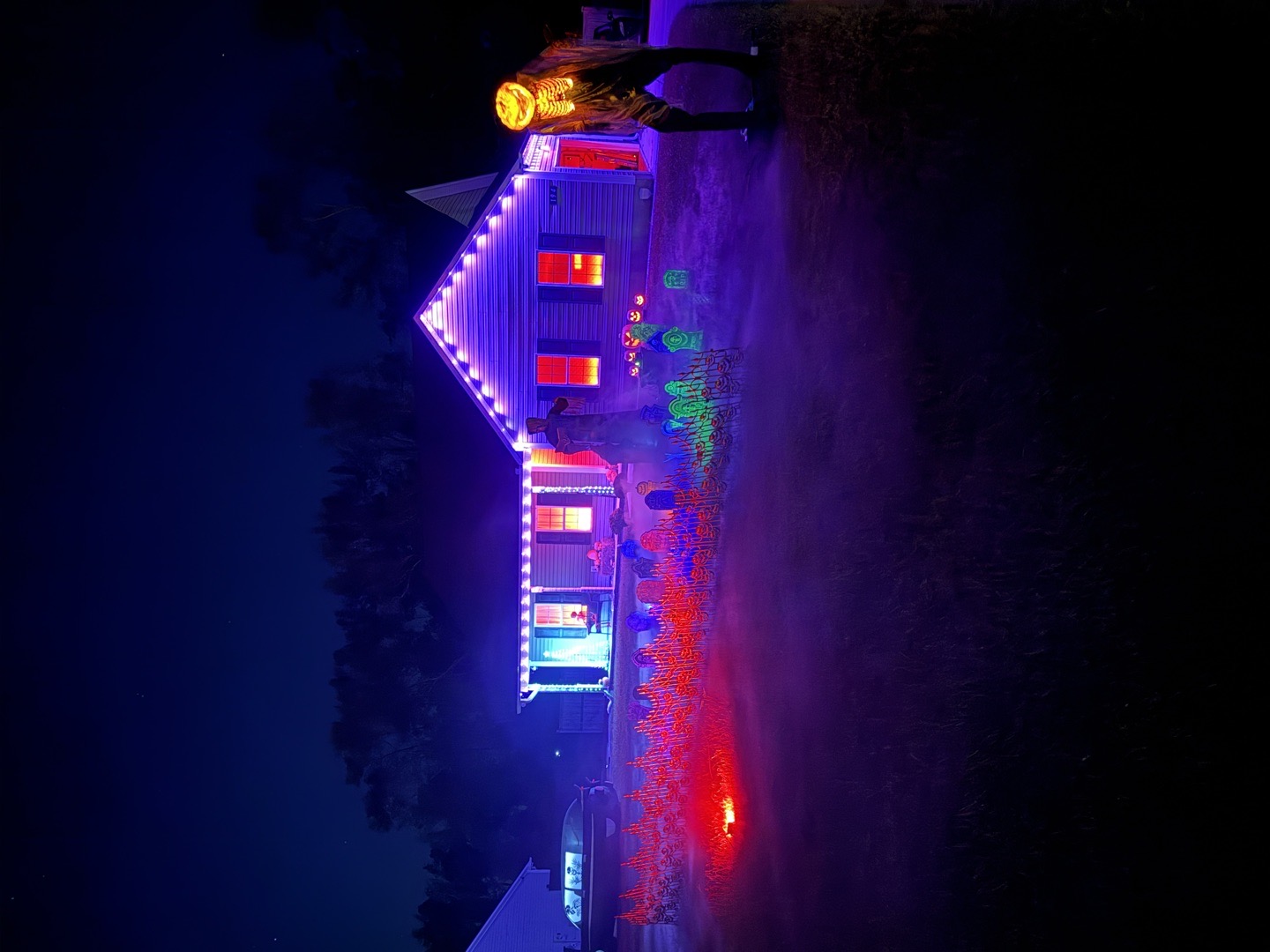 Graveyard W/ Lit Up House in Beulaville, North Carolina