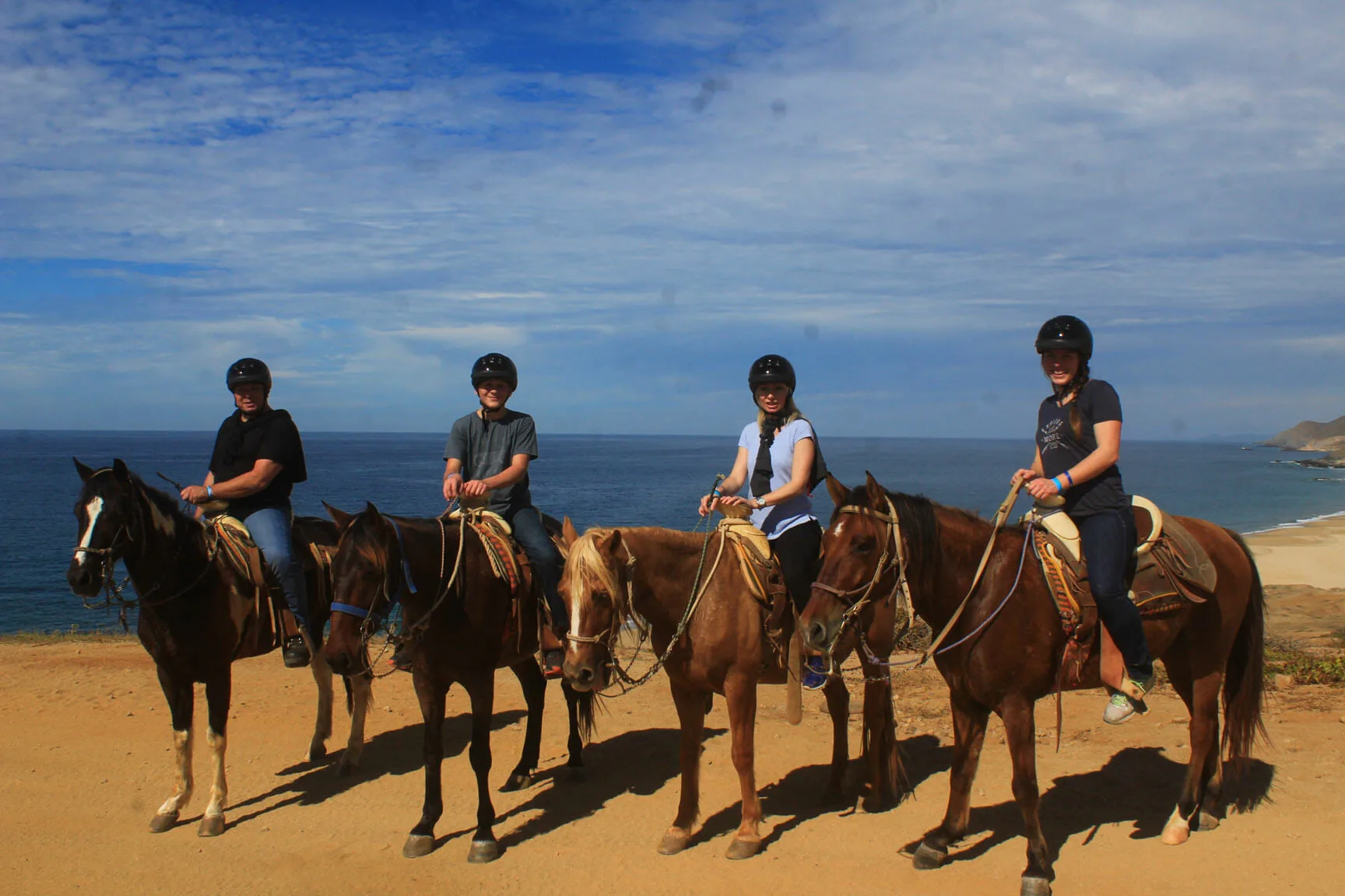 Horseback Riding On The Beach