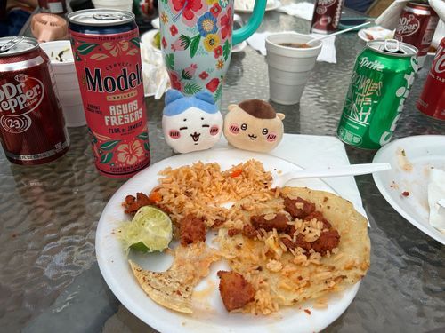@10\10 Good drink good taco good rice.