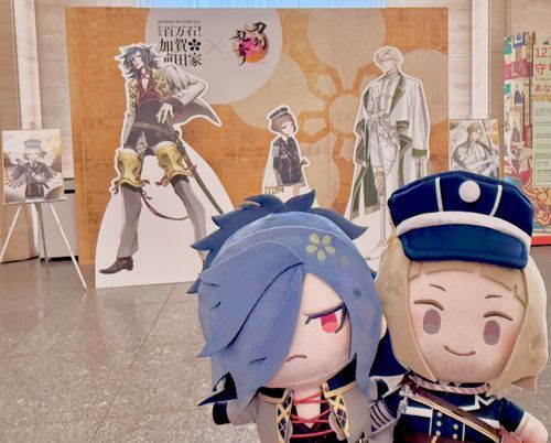 パネルの前で記念撮影