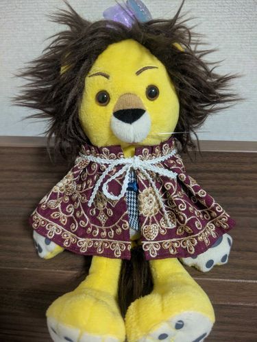 いんどししゅうの りぼんでつくった とてもごうかなけーぷ