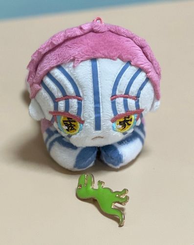恐竜のバッヂとはぐ座
