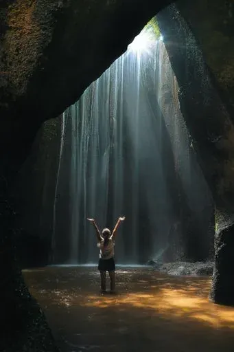 Tukad Cepung Waterfall in Ubud region of Bali