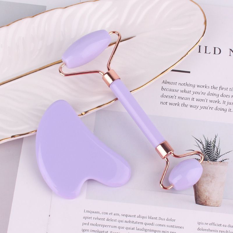 Bâton de massage à roulettes roses miniature 3