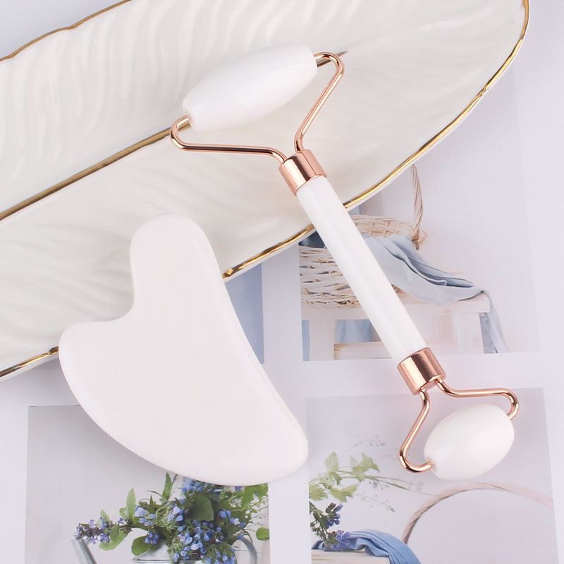 Bâton de massage à roulettes roses - image 1