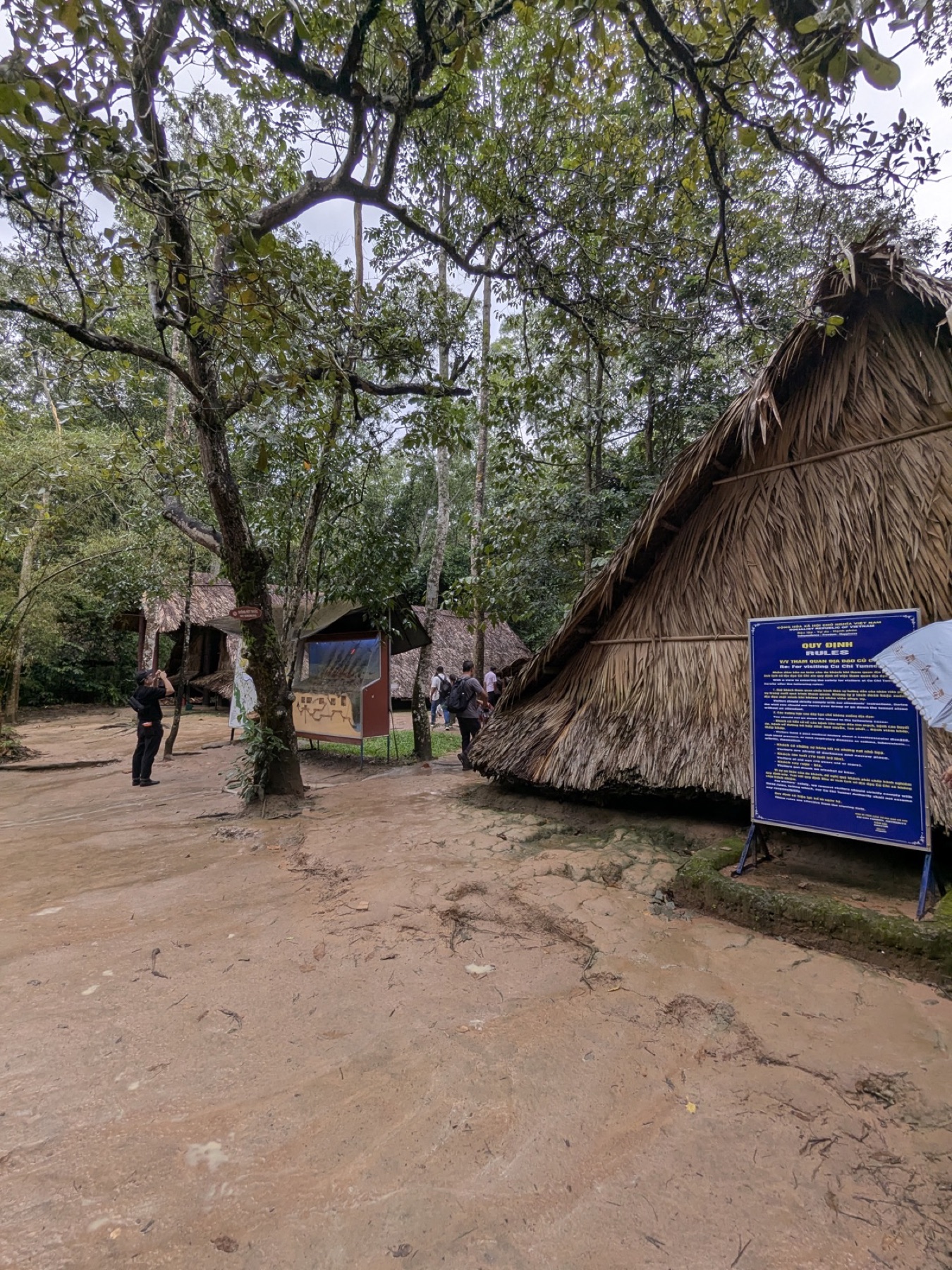 A forest path and interpretation area at Cu Chi